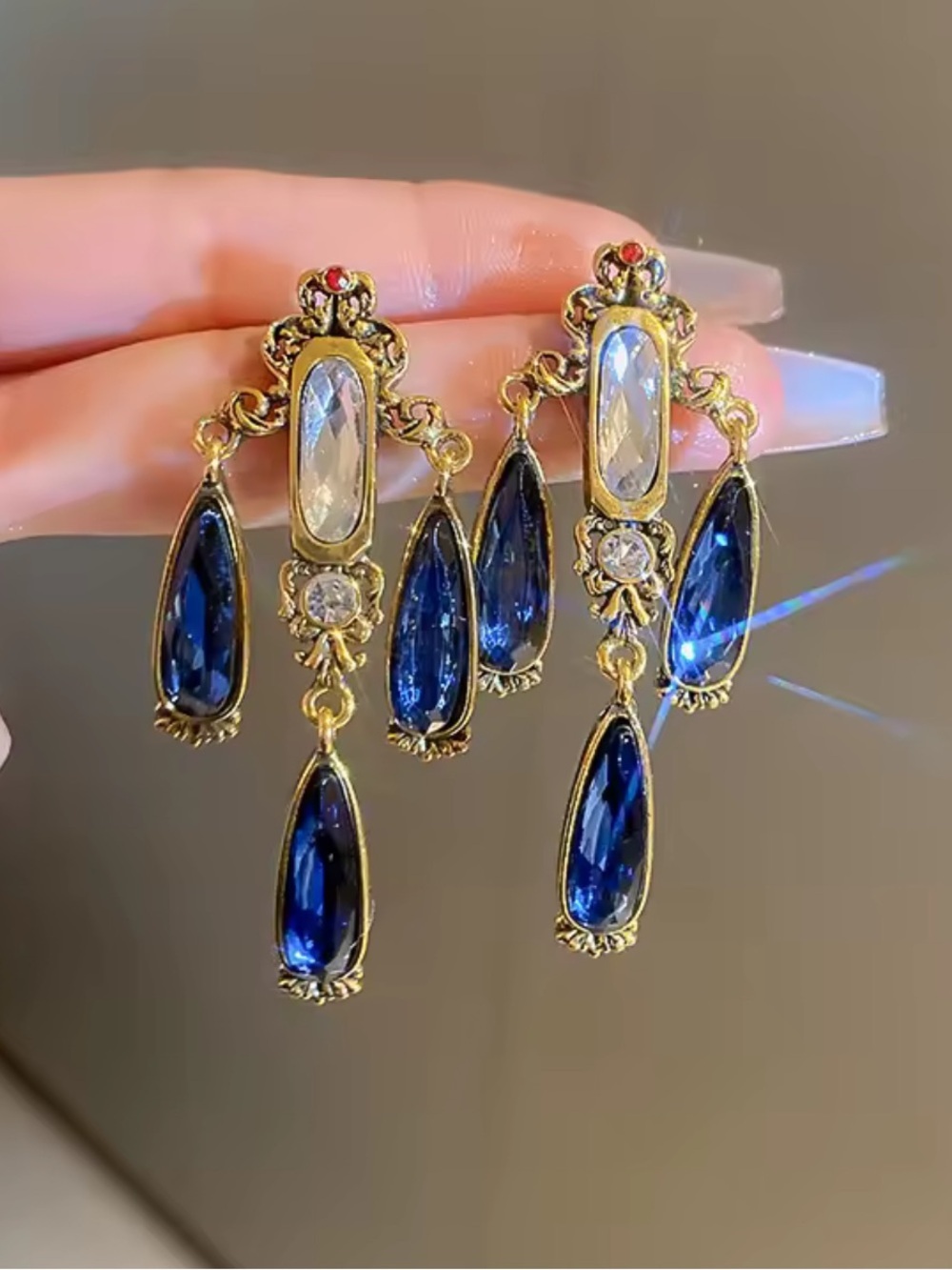 Gold-Tone Earrings with Deep Blue and Clear Stones